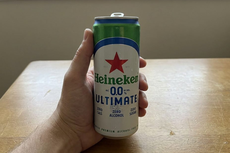 Me holding a Heineken 0.0 Ultimate in my kitchen. The can looks the part.